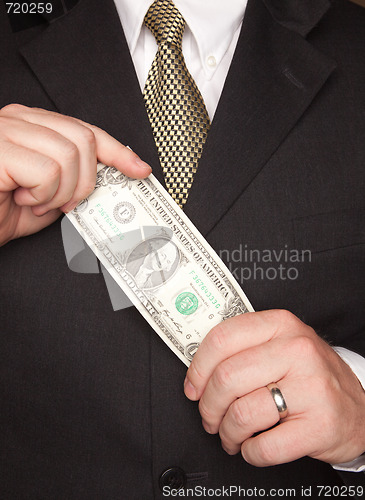 Image of Businessman Holding Dollar Bill