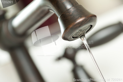 Image of Water Dripping from Water Faucet