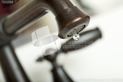 Image of Water Dripping from Water Faucet