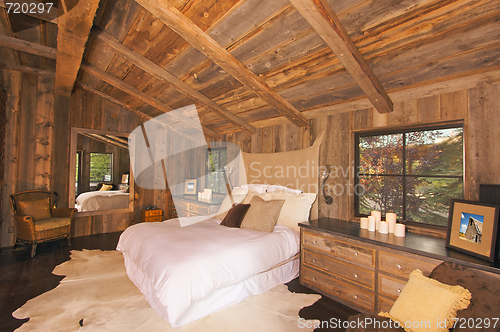 Image of Luxurious Rustic Log Cabin Bedroom