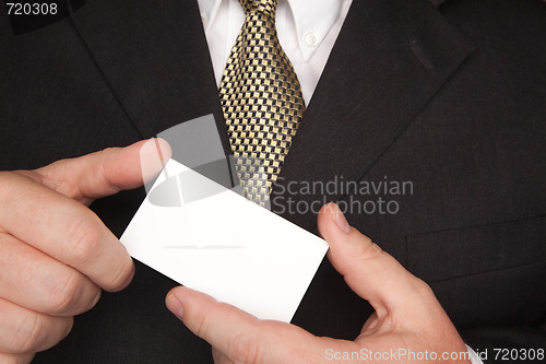 Image of Businessman Holding Blank Business Card