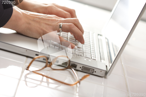 Image of Female Using Laptop