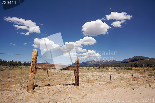 Image of Aged Fence and Clouds