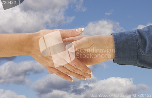 Image of Man and woman shaking hands.