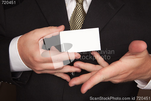Image of Businessman Holding Blank Business Card