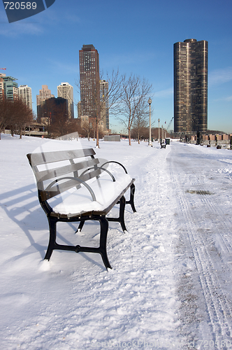 Image of Empty Snowy Bench in Chicago