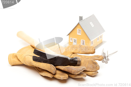 Image of Hammer, Gloves, Nails and House