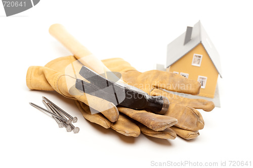 Image of Hammer, Gloves, Nails and House