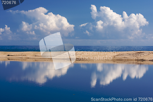 Image of Tropical Shoreline with Clouds