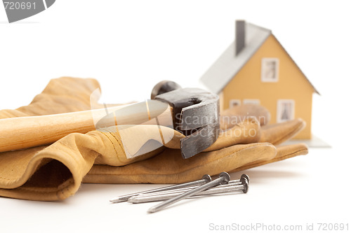 Image of Hammer, Gloves, Nails and House