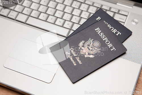 Image of Passports on Laptop Keyboard