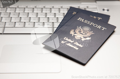Image of Passports on Laptop Keyboard