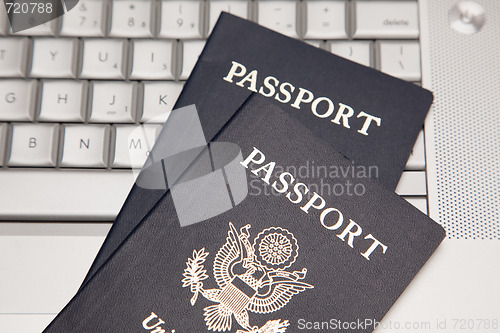 Image of Passports on Laptop Keyboard