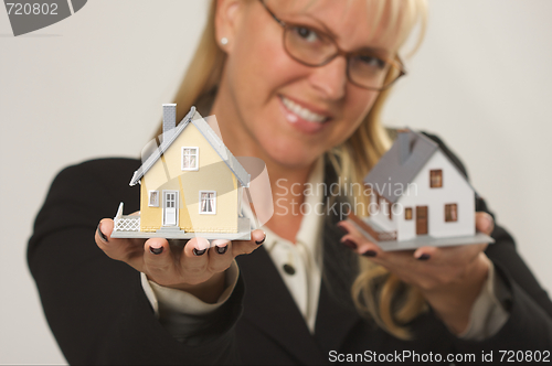 Image of Houses in Female Hands