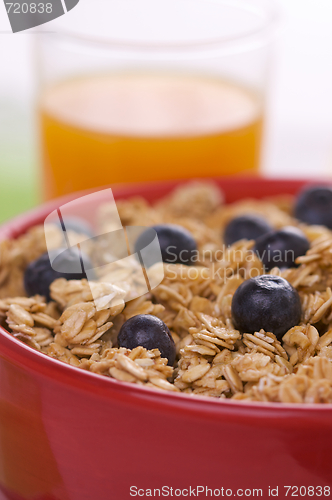 Image of Bowl of Granola and Boysenberries and Juice