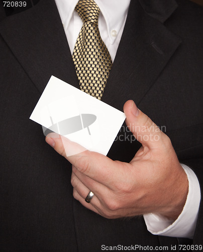Image of Businessman Holding Blank Business Card