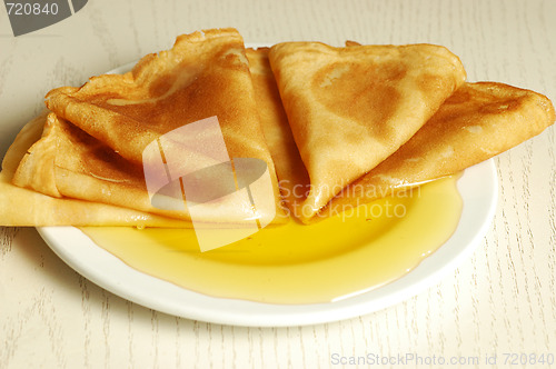 Image of pancakes with honey