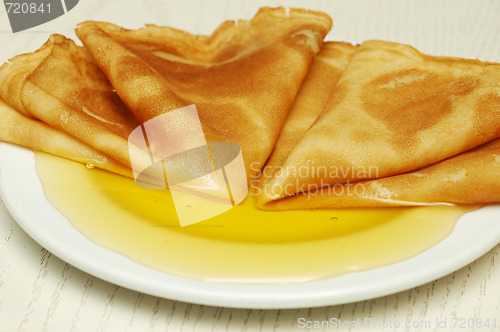 Image of pancakes with honey