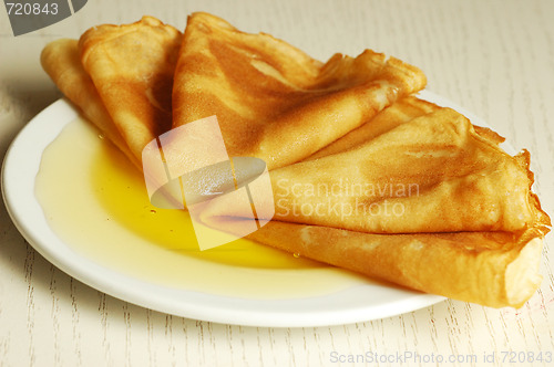 Image of pancakes with honey