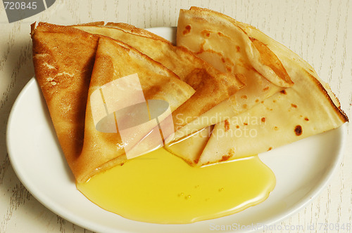 Image of pancakes with honey