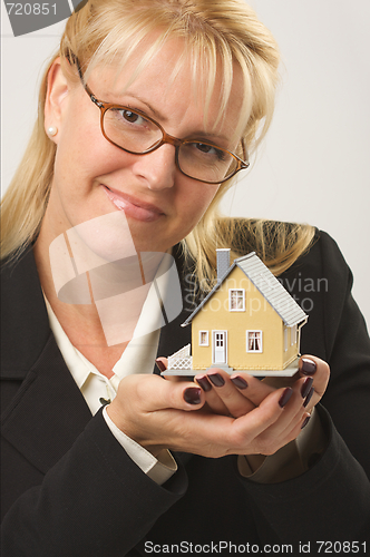 Image of Woman Holding House