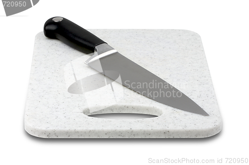 Image of Large Knife on Cutting Board
