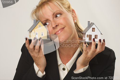 Image of Houses in Female Hands