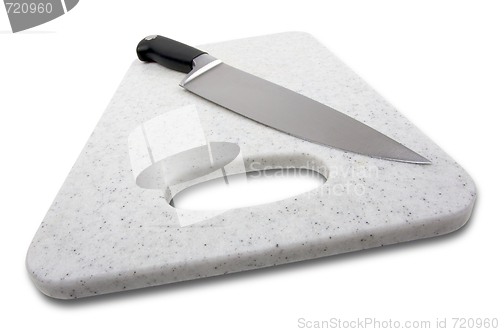 Image of Large Knife on Cutting Board