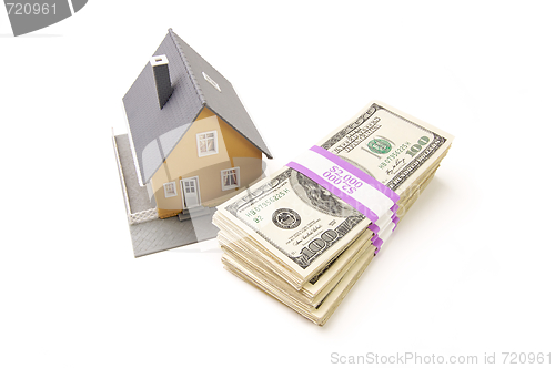 Image of Home and Stacks of Money Isolated