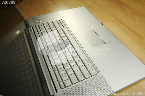 Image of Angled Laptop Image on Desk