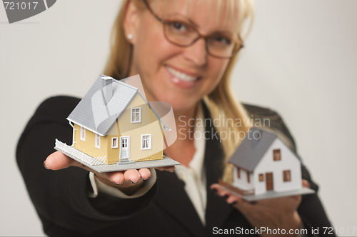 Image of Houses in Female Hands