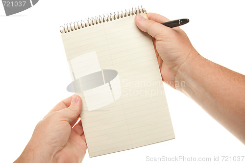 Image of Male Hands Holding Pen and Pad of Paper