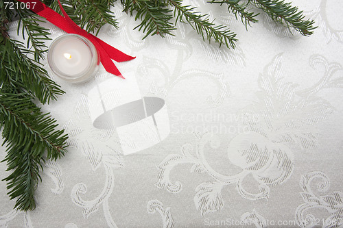 Image of Silk Christmas Background with Candle and Pine Branches