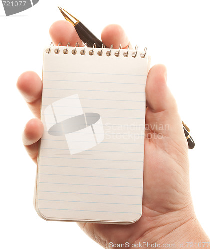 Image of Male Hands Holding Pen and Pad of Paper