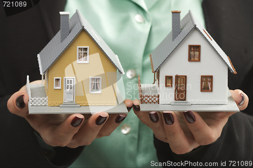 Image of Houses in Female Hands