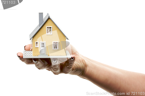 Image of House in Female Hand