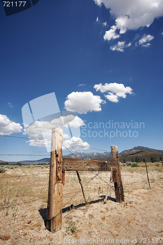 Image of Aged Fence and Clouds