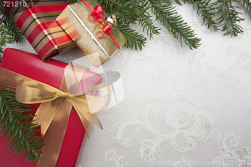 Image of Silk Christmas Background with Gilfs and Pine Branches