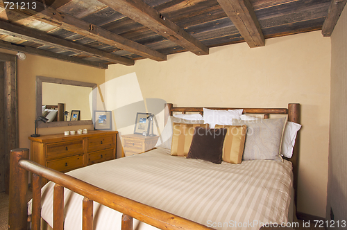 Image of Luxurious Rustic Log Cabin Bedroom