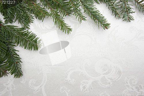 Image of Silk Christmas Background Framed with Pine Branches