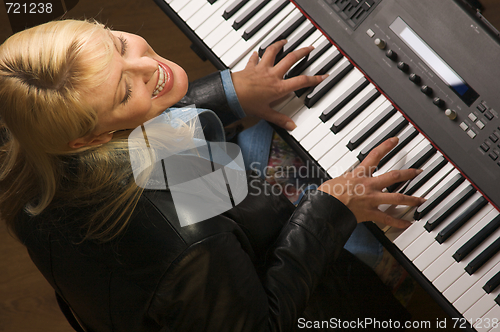 Image of Female Musician Performs