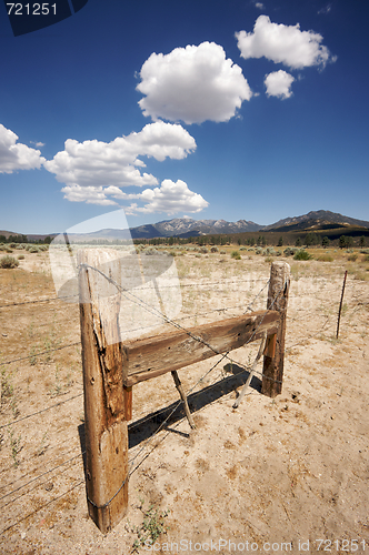 Image of Aged Fence and Clouds
