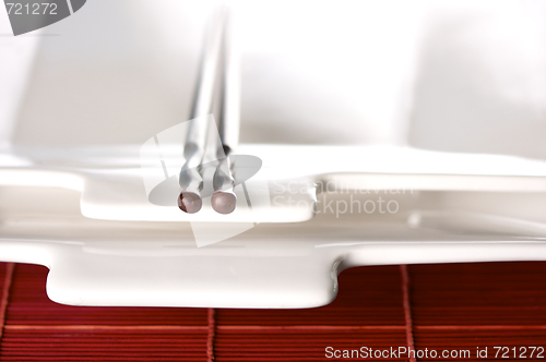 Image of Wooden Chopsticks & White Plate