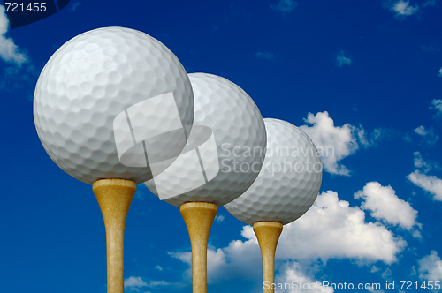 Image of Three Golf Balls & Tees