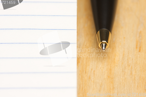 Image of Pen and Pad of Paper