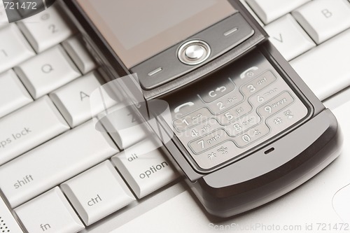 Image of Cell Phone on Laptop Macro