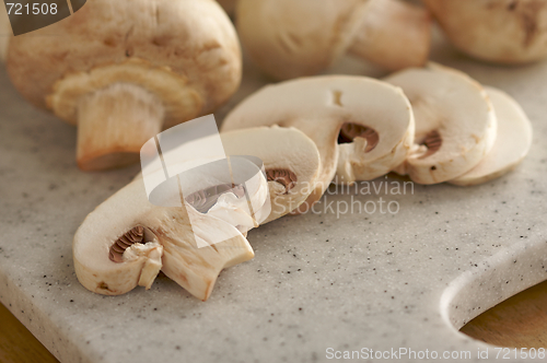 Image of Mushrooms on a Cutting Board