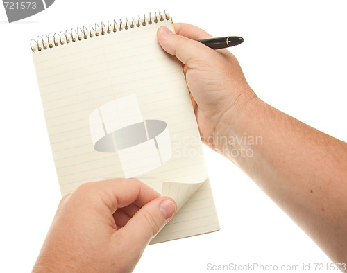 Image of Male Hands Holding Pen and Pad of Paper