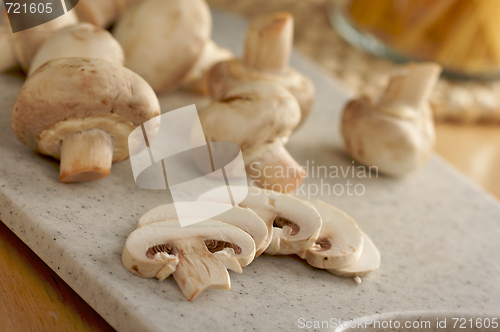 Image of Mushrooms on a Cutting Board