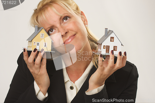 Image of Houses in Female Hands